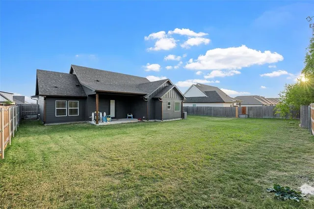 a workspace with furniture and a window