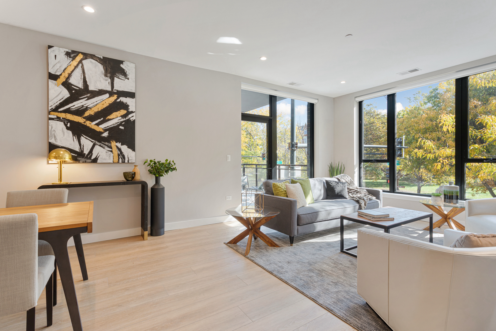 Undisclosed Address Chicago, IL 60618 - Photo 11 of 34 a living room with furniture and floor to ceiling windows