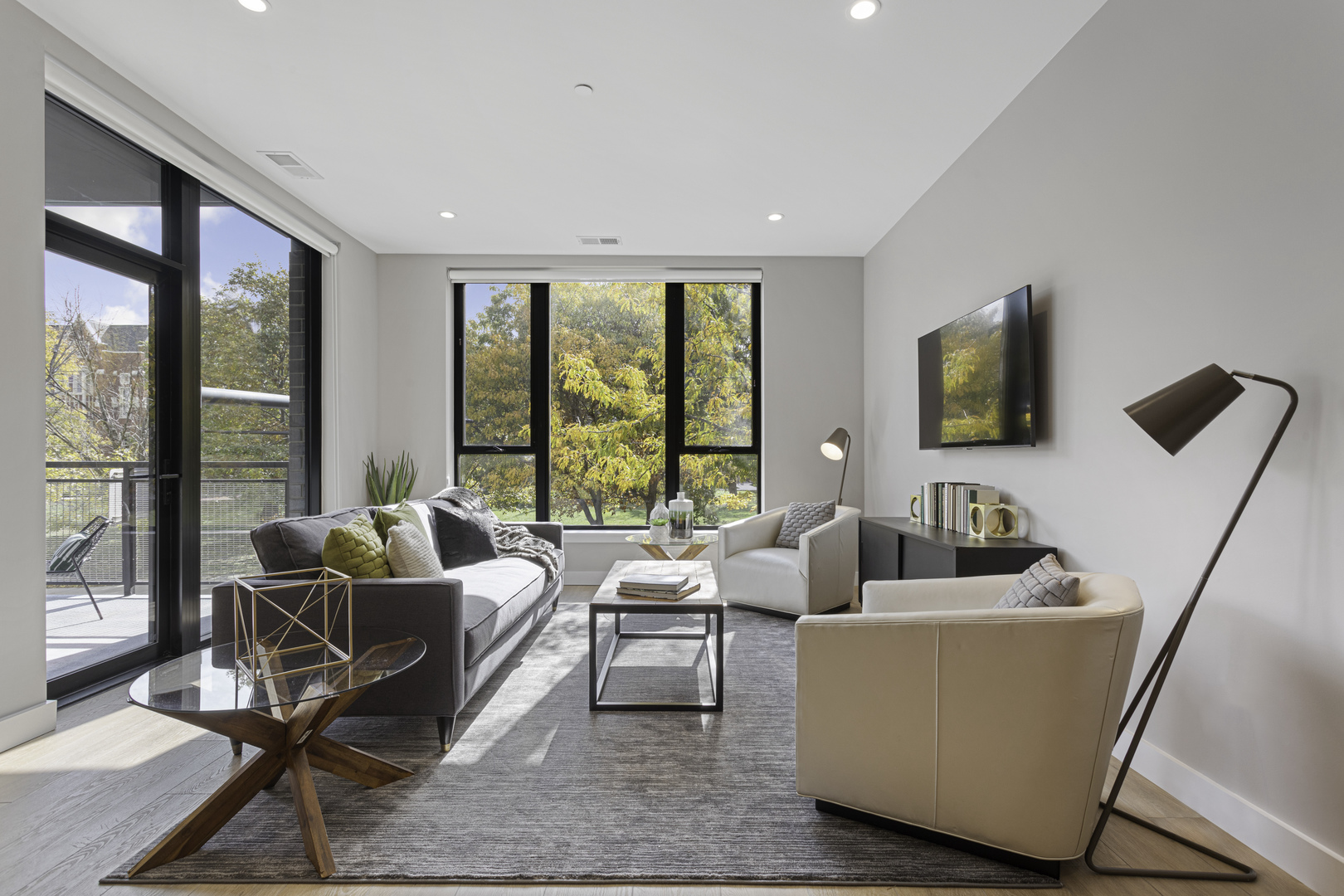 Undisclosed Address Chicago, IL 60618 - Photo 12 of 34 a living room with furniture and large windows
