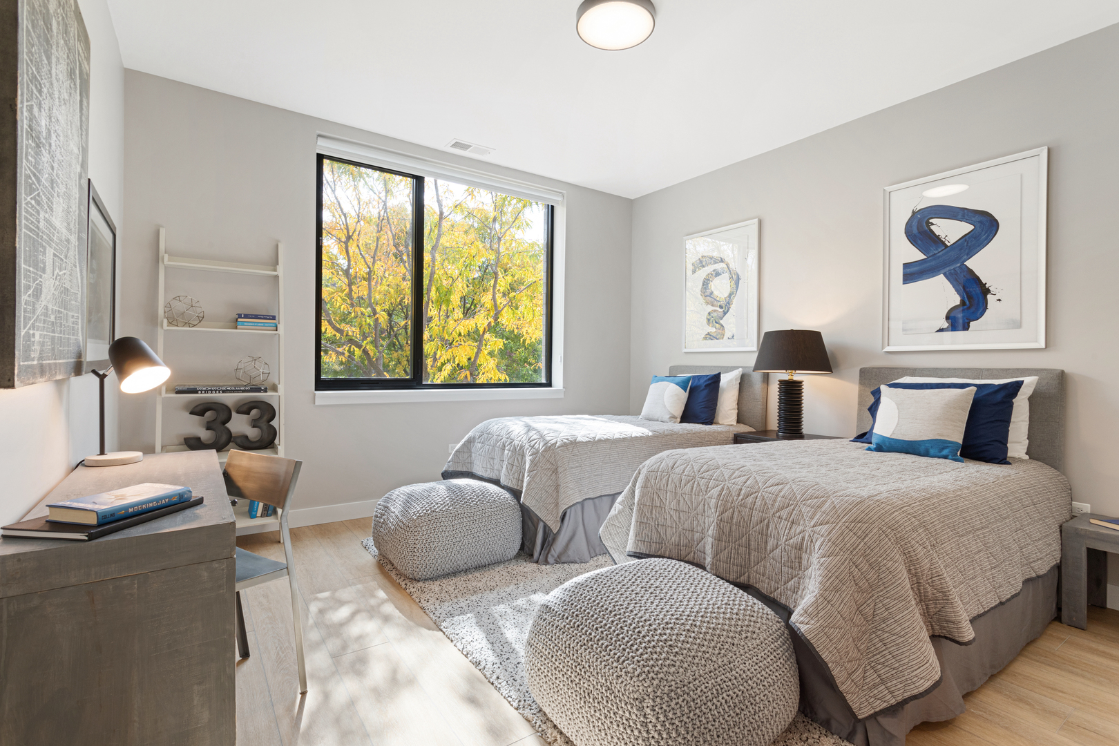 Undisclosed Address Chicago, IL 60618 - Photo 28 of 34 a bedroom with two beds and a large window