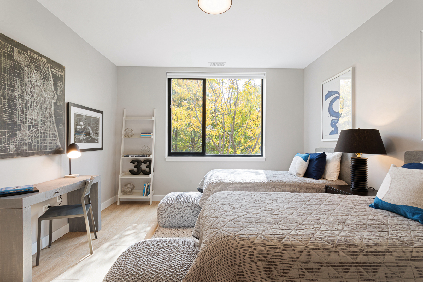 Undisclosed Address Chicago, IL 60618 - Photo 29 of 34 a bedroom with a bed and a window with chair