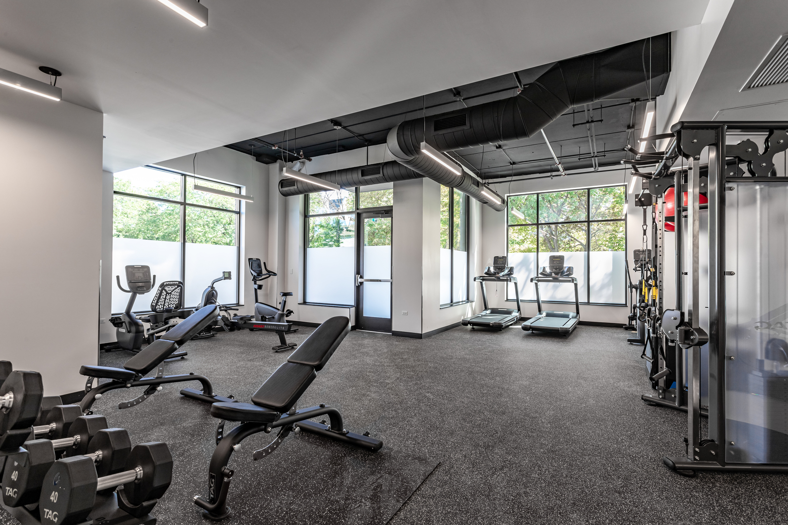 Undisclosed Address Chicago, IL 60618 - Photo 4 of 34 a view of a room with gym equipment