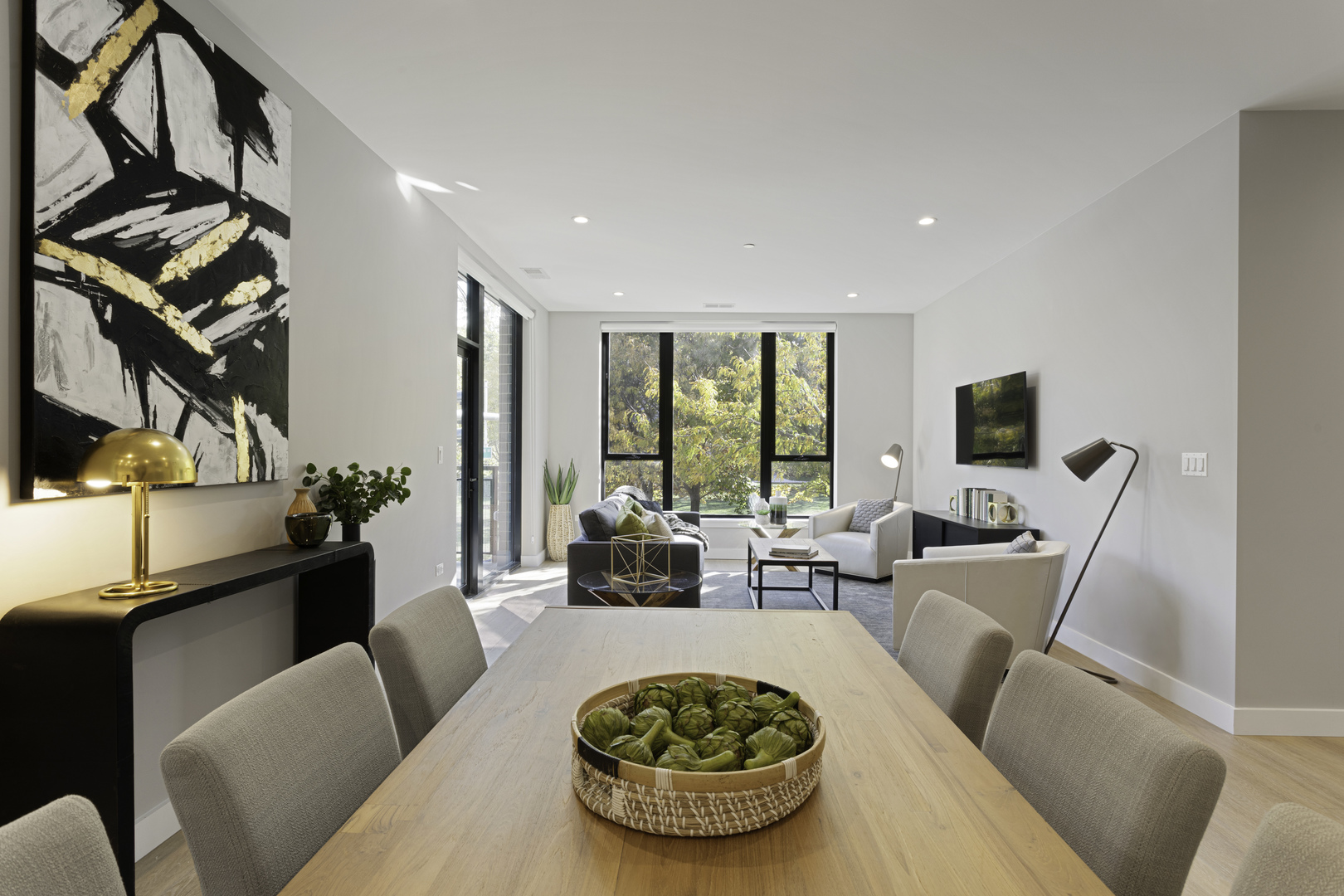 Undisclosed Address Chicago, IL 60618 - Photo 8 of 34 a living room with furniture a rug and a chandelier