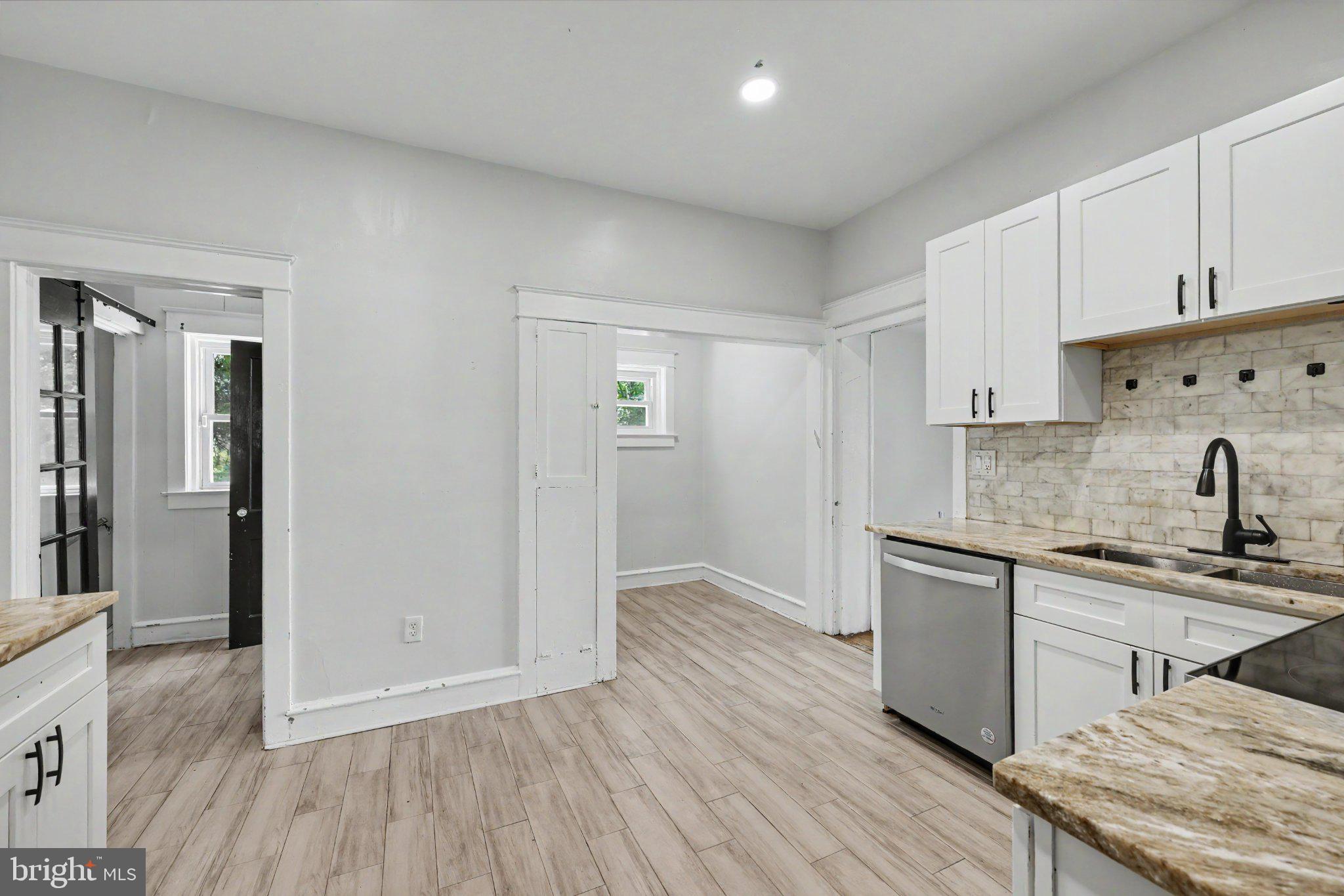 2470 Dutton Mill Road Aston, PA 19014 - Photo 12 of 52 EAT IN KITCHEN WITH POWDER ROOM OFF TO THE LEFT