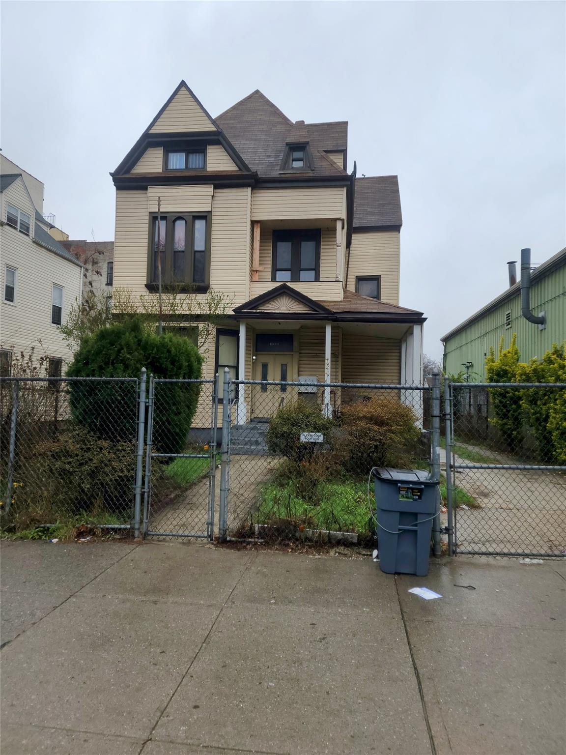 1266 Boston Road Bronx, NY 10456 - Photo 1 of 3 a front view of a house with plants
