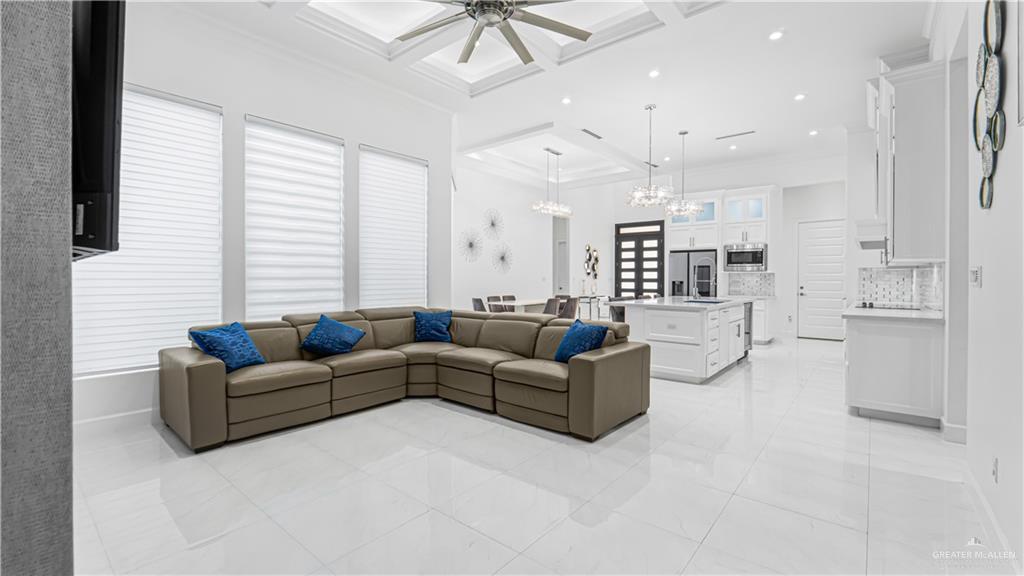 1505 Duke Street Mission, TX 78572 - Photo 13 of 39 a living room with furniture and a large window