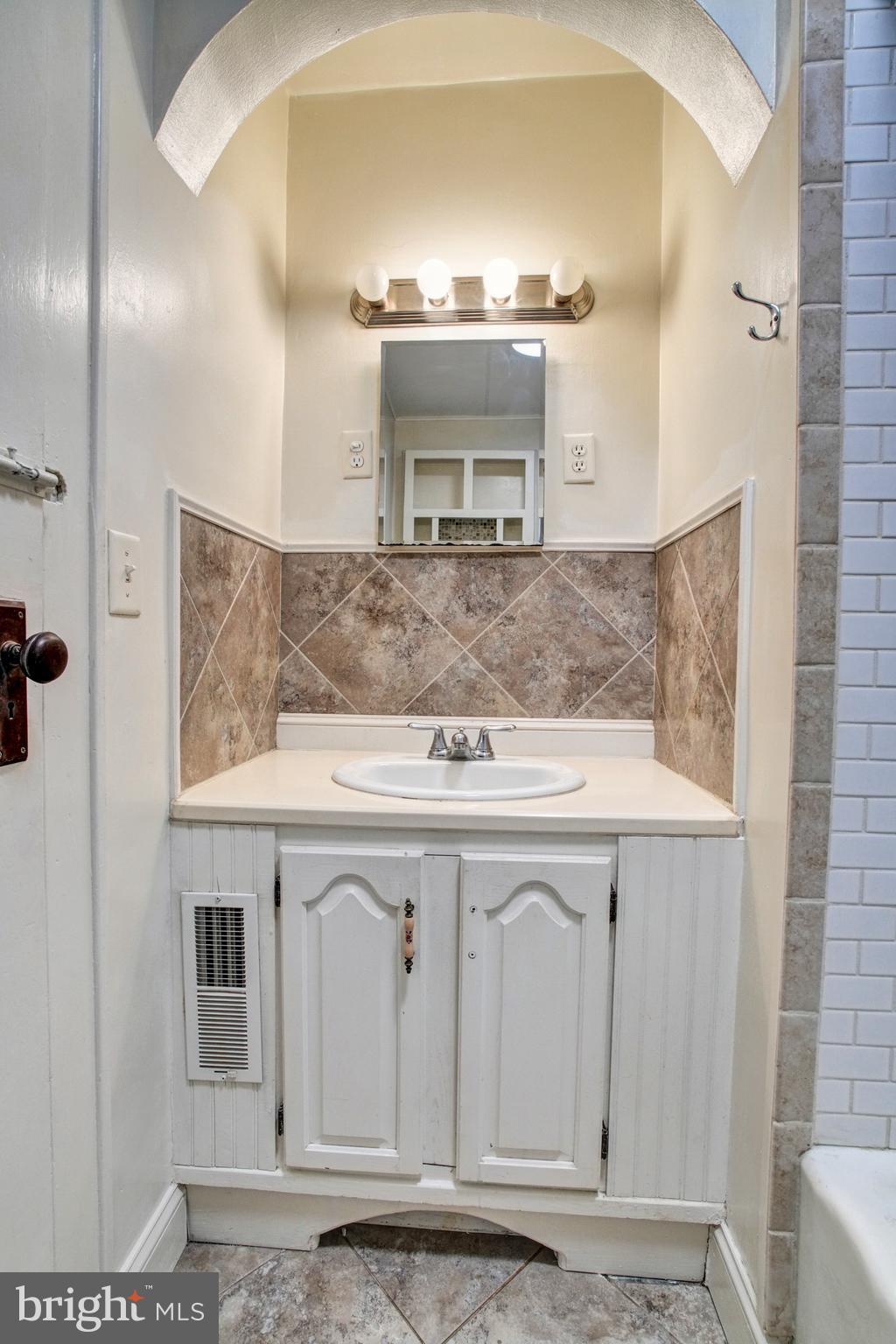 74 Baptist Church Road Spring City, PA 19475 - Photo 15 of 24 a view of a sink a mirror and cabinets