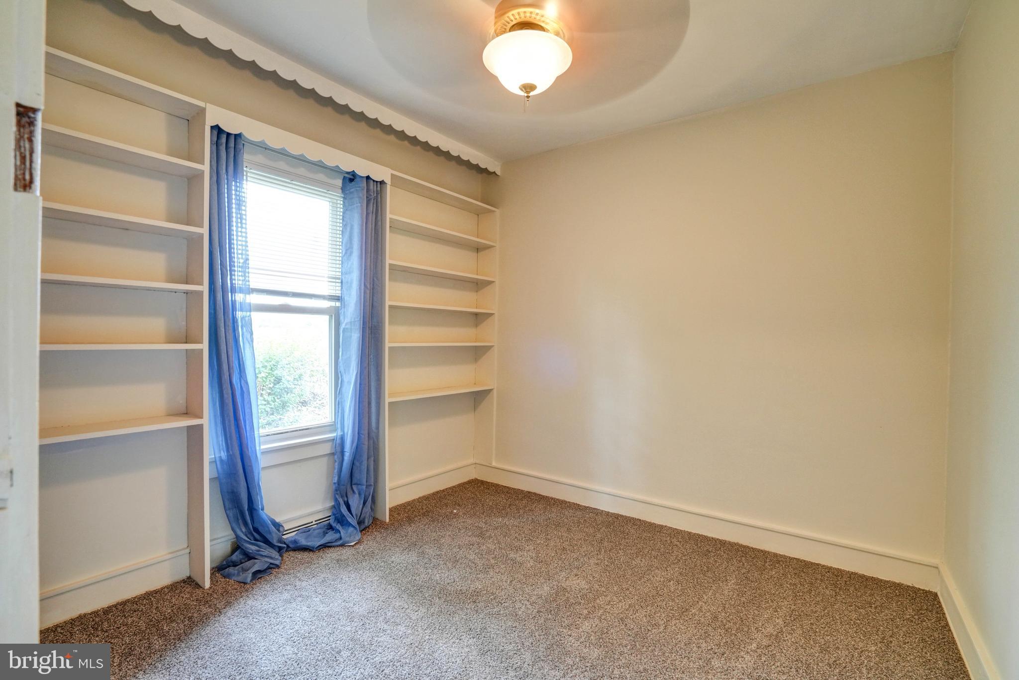 74 Baptist Church Road Spring City, PA 19475 - Photo 18 of 24 a view of an empty room and a windows