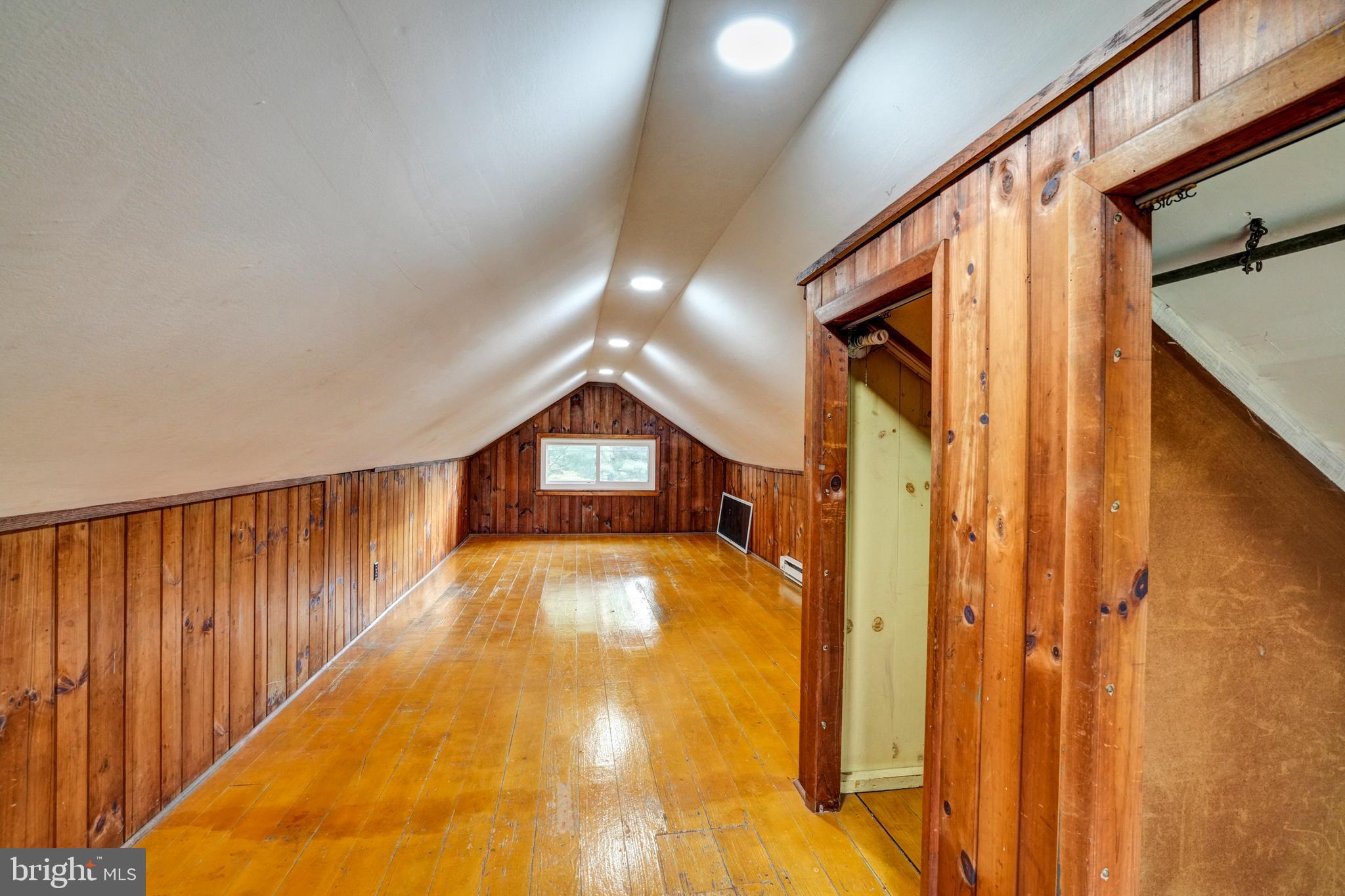 74 Baptist Church Road Spring City, PA 19475 - Photo 20 of 24 a view of a hallway with wooden floor and staircase