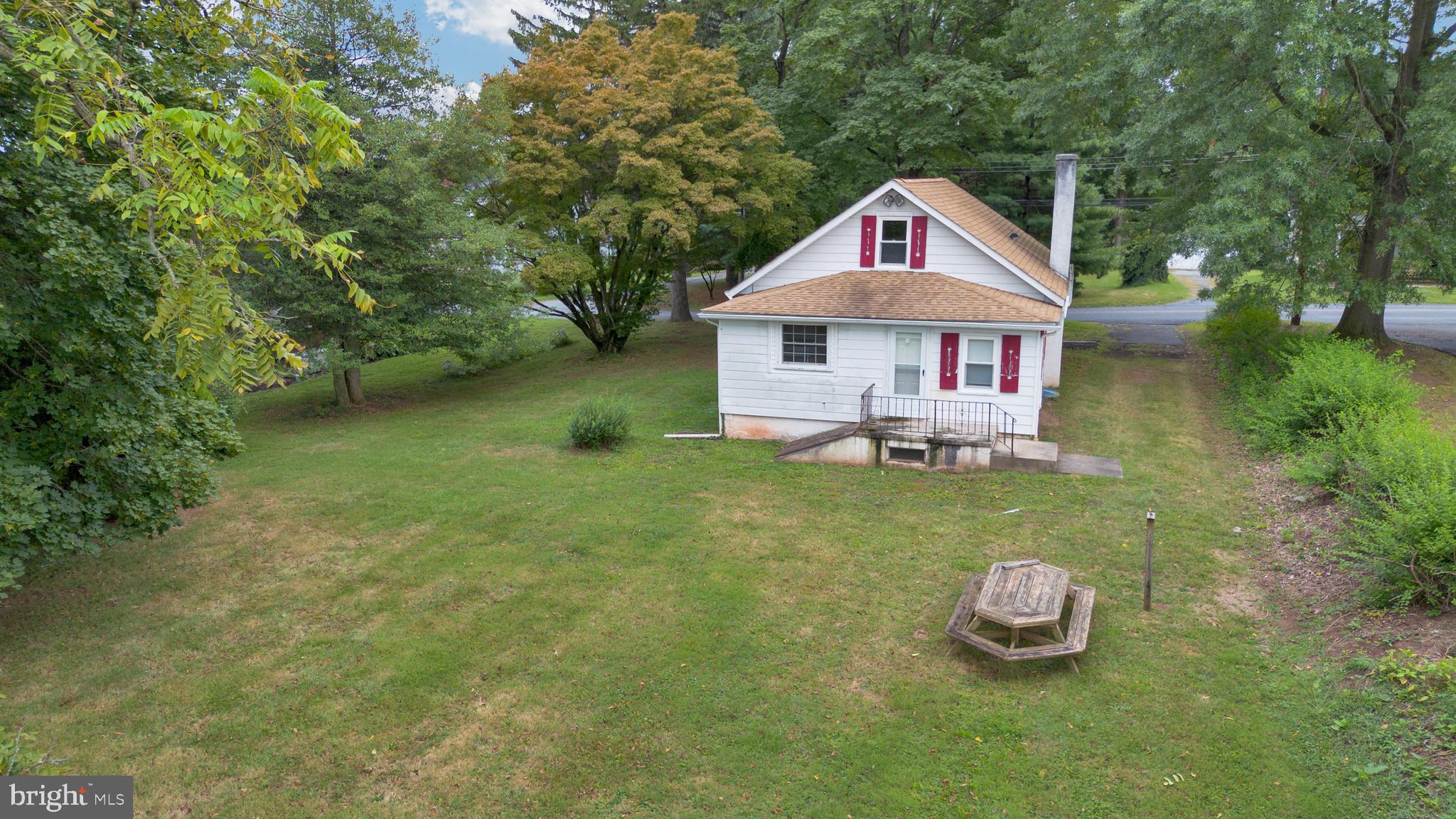 74 Baptist Church Road Spring City, PA 19475 - Photo 23 of 24 a front view of a house with garden