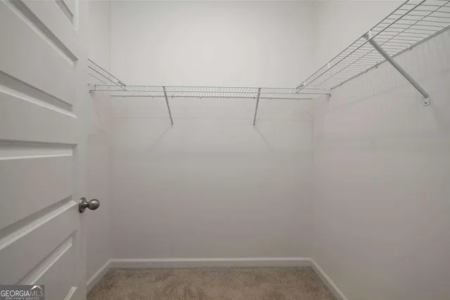 a view of swimming pool with a yard