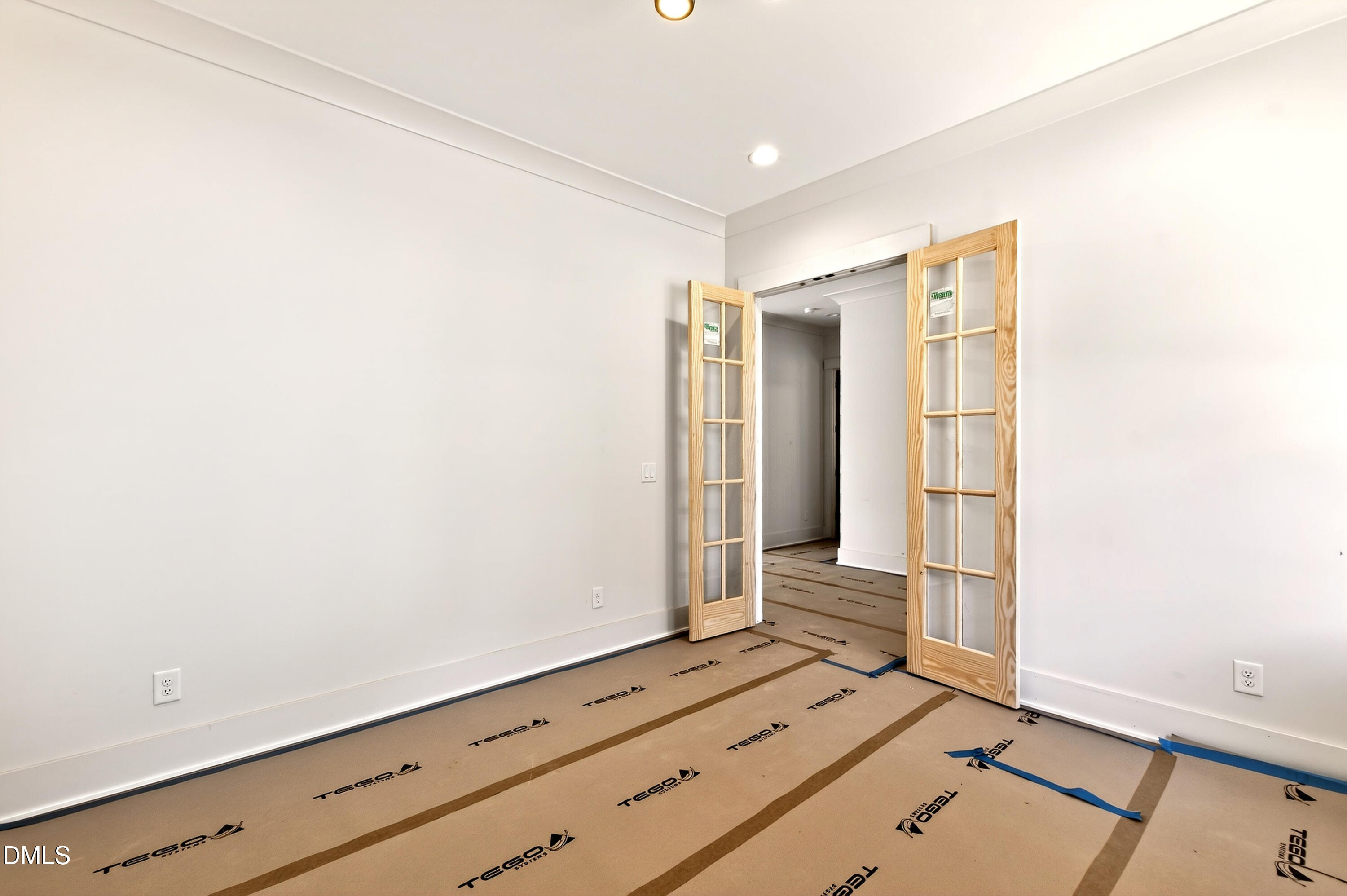909 Oberlin Road Raleigh, NC 27605 - Photo 5 of 59 a view of room with wooden floor
