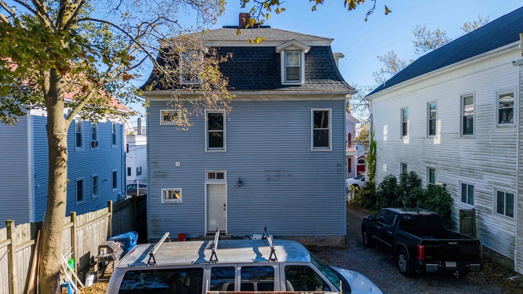 145 State Street New Bedford, MA 02740 - Photo 11 of 15 a front view of a house with yard
