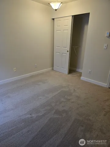 an empty room with closet