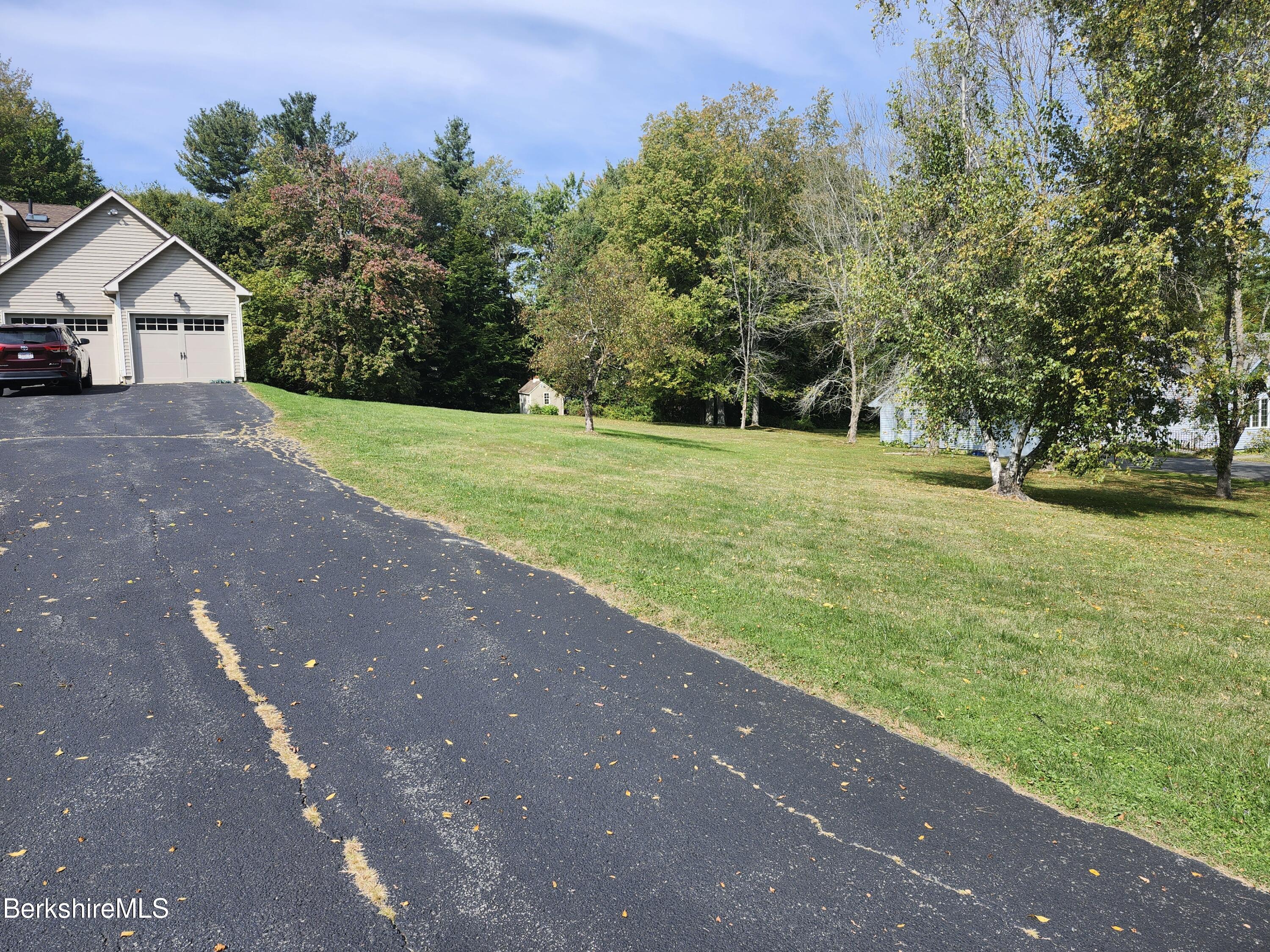 10 Lillybrook Road Pittsfield, MA 01201 - Photo 12 of 91 a view of a house with yard and a garden