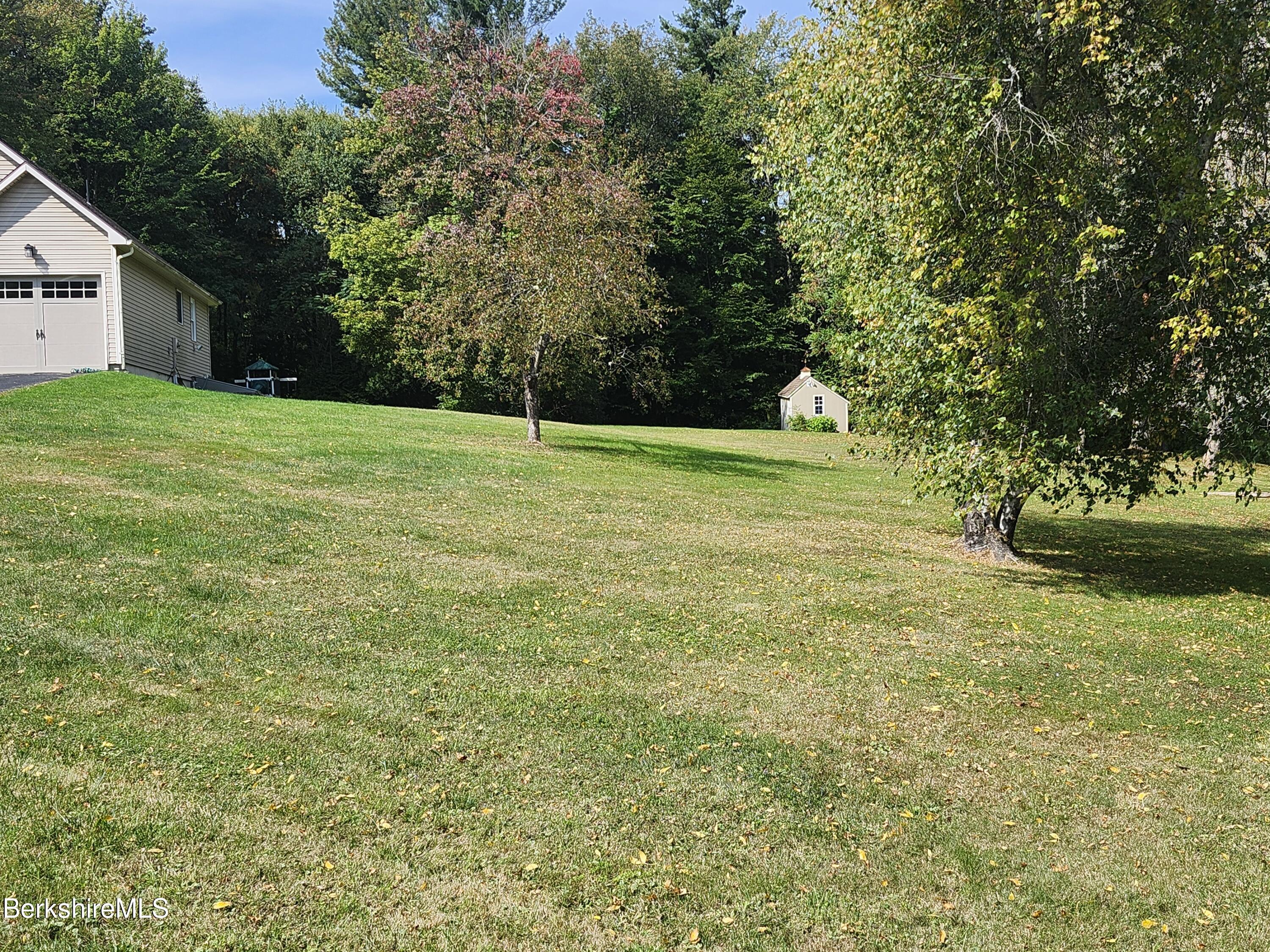 10 Lillybrook Road Pittsfield, MA 01201 - Photo 16 of 91 a swimming pool with wooden fence