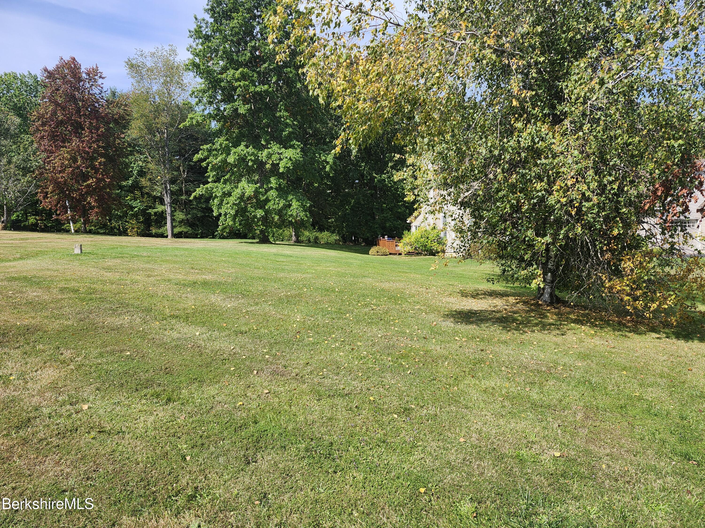 10 Lillybrook Road Pittsfield, MA 01201 - Photo 33 of 91 a view of a field with trees in the background