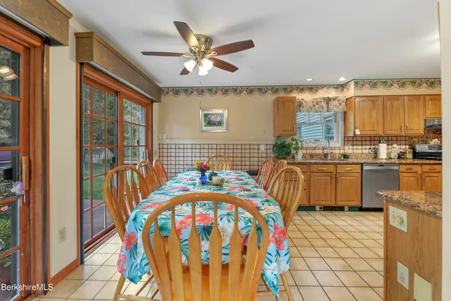 a bedroom with a bed and dresser