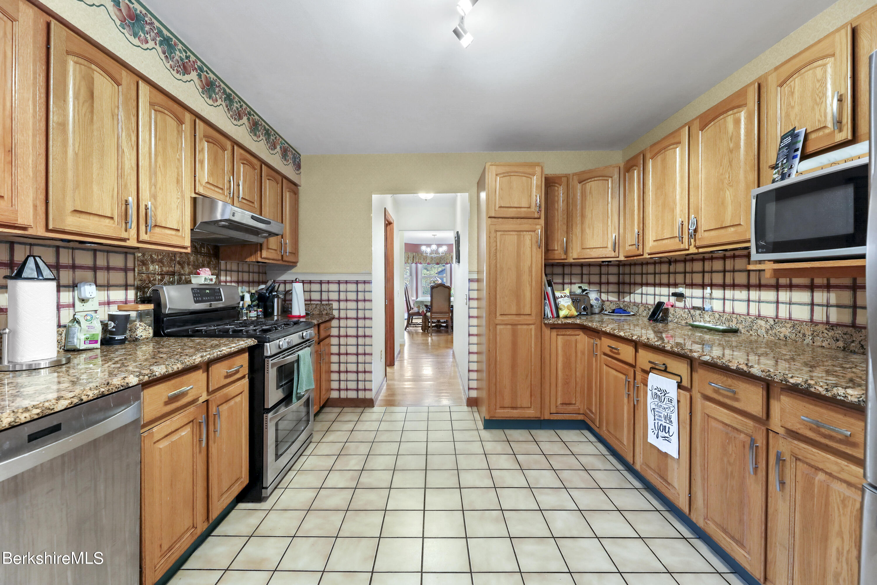10 Lillybrook Road Pittsfield, MA 01201 - Photo 48 of 91 a large kitchen with stainless steel appliances granite countertop a stove and cabinets