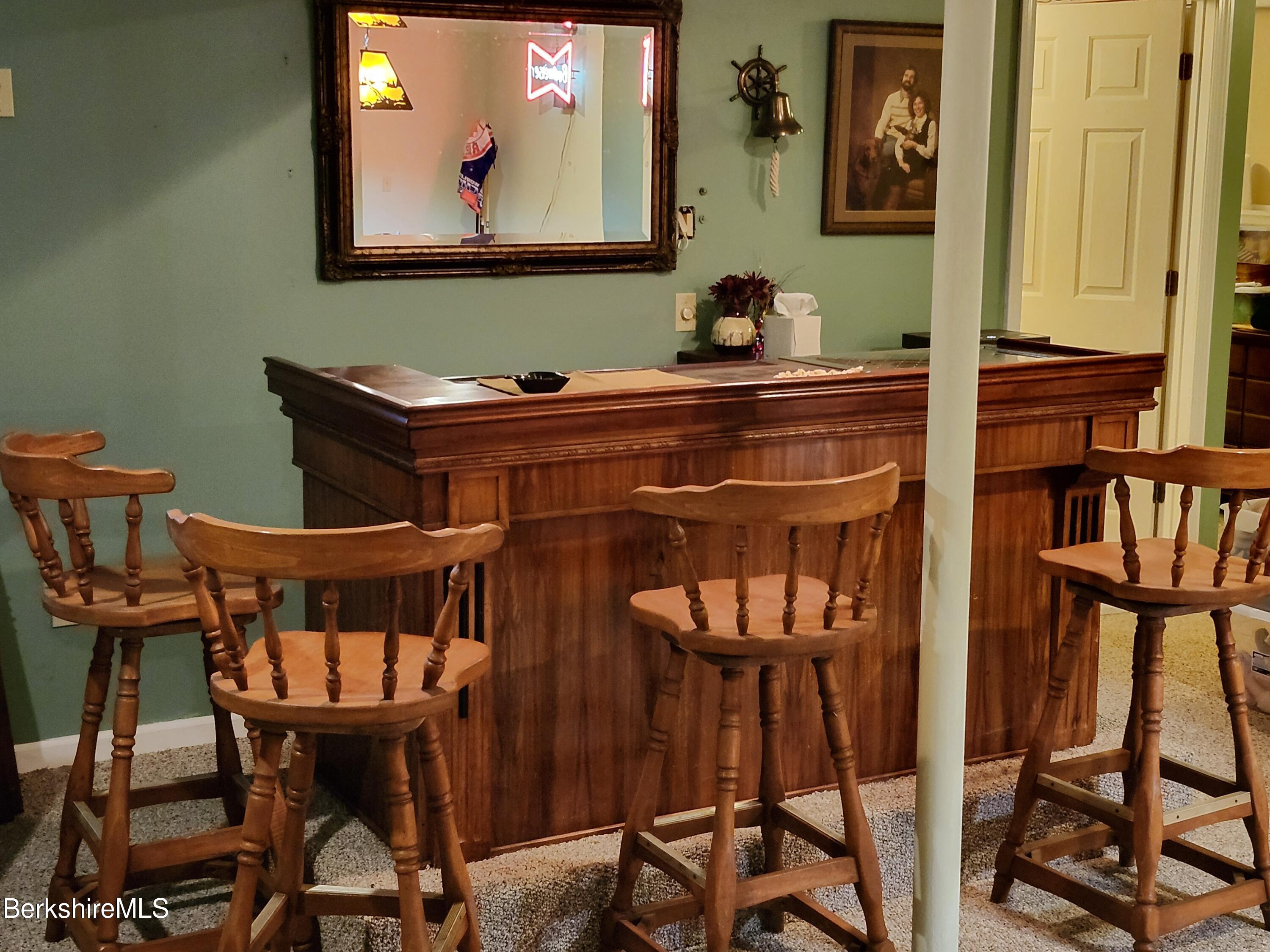 10 Lillybrook Road Pittsfield, MA 01201 - Photo 81 of 91 a view of a dining room with furniture and a flat screen tv