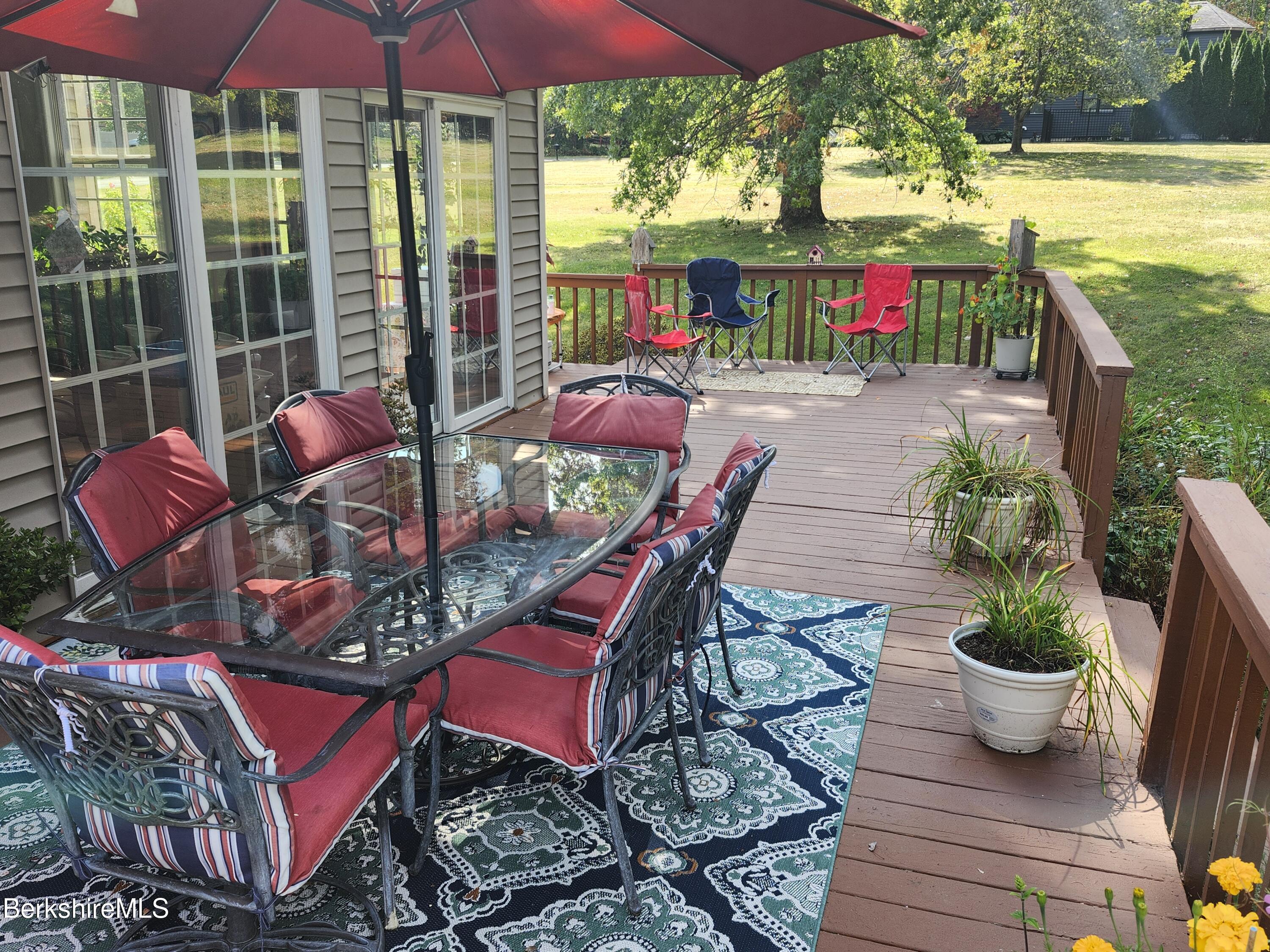 10 Lillybrook Road Pittsfield, MA 01201 - Photo 88 of 91 a wooden bench sitting in front of a building