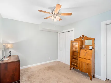 a view of a livingroom with a furniture