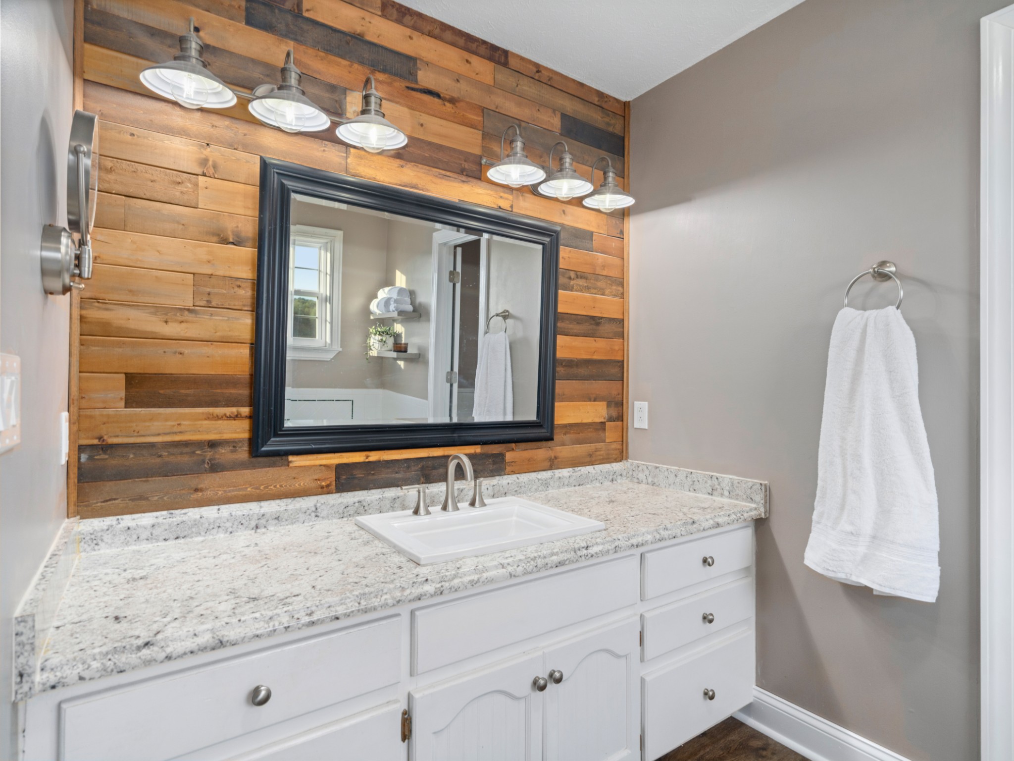 5439 Minnis Road Springfield, TN 37172 - Photo 22 of 43 a bathroom with a sink vanity and a mirror