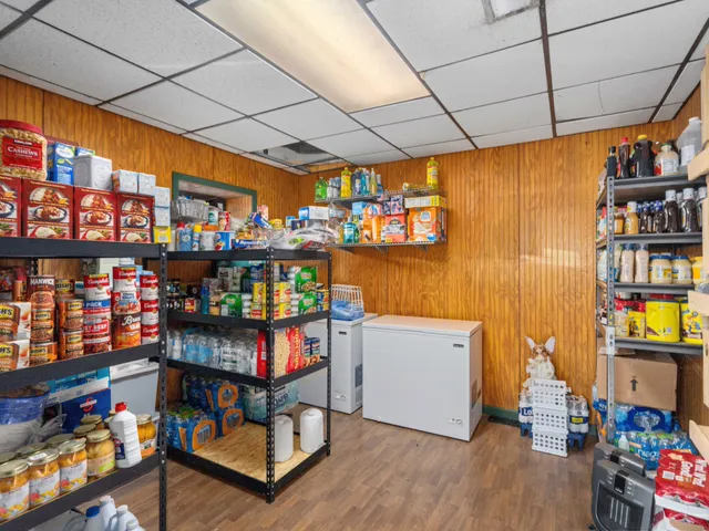 a room with wooden furniture and lots of wooden furniture