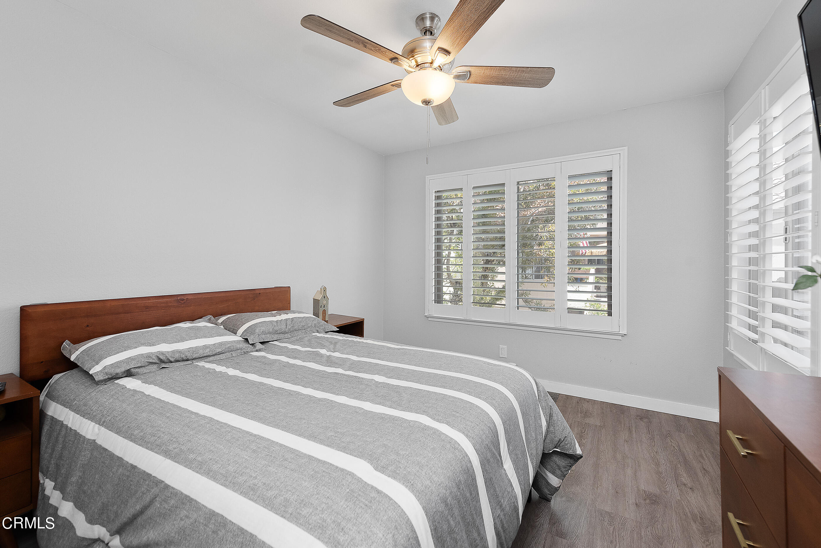 1718 Sinaloa Road, Unit 220 Simi Valley, CA 93065 - Photo 13 of 35 a bedroom with a bed and a window