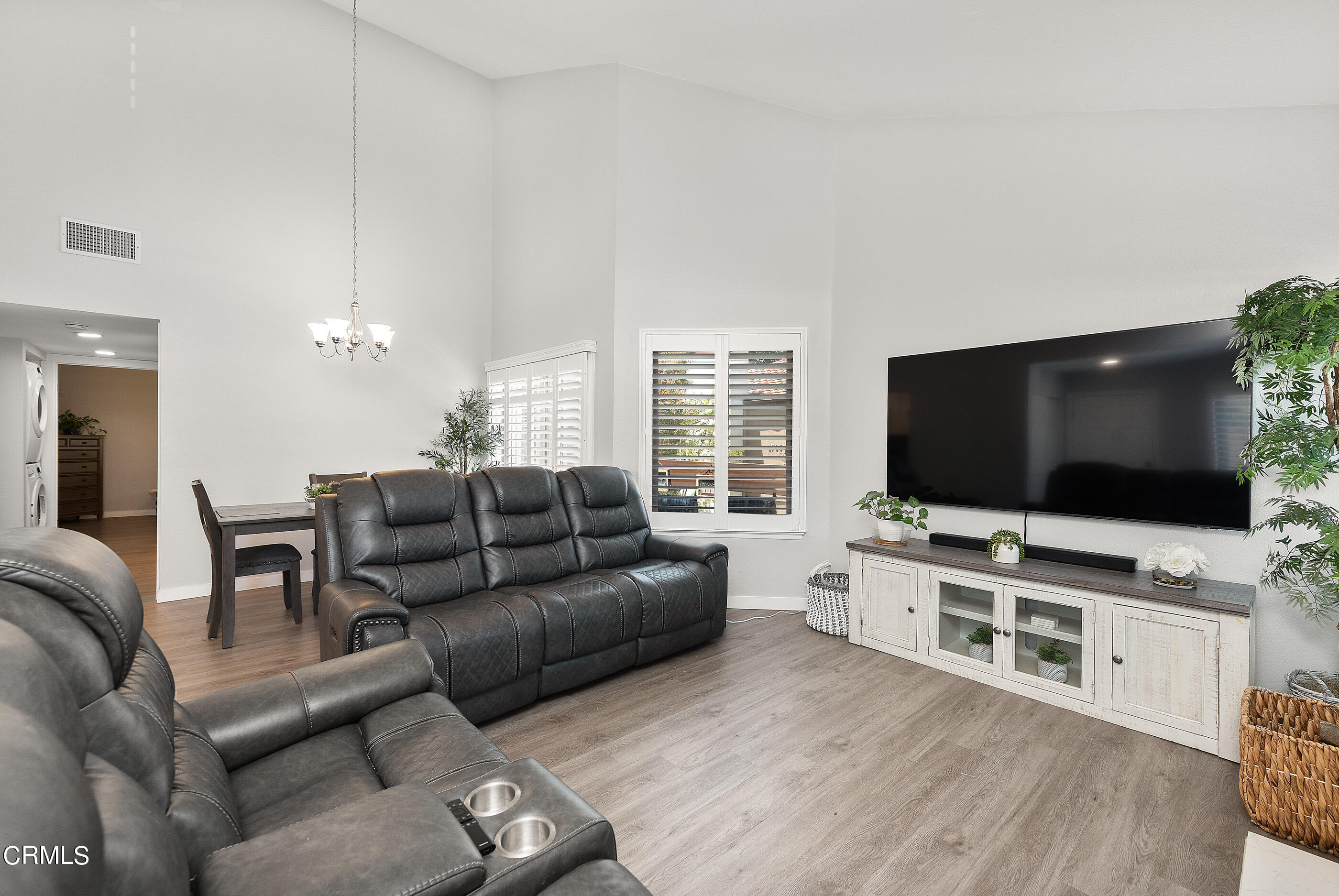 1718 Sinaloa Road, Unit 220 Simi Valley, CA 93065 - Photo 3 of 35 a living room with furniture and a flat screen tv