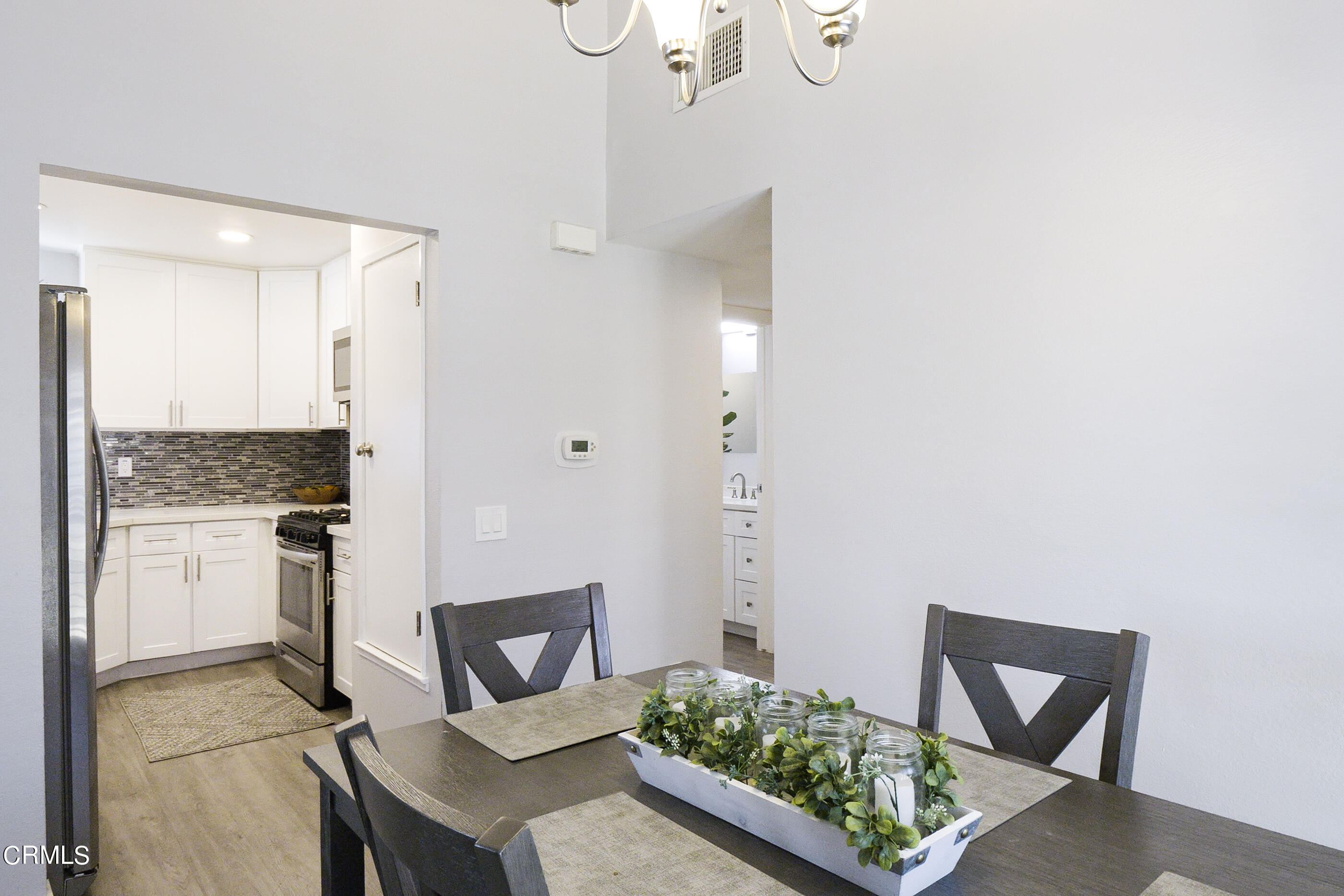 1718 Sinaloa Road, Unit 220 Simi Valley, CA 93065 - Photo 9 of 35 a view of kitchen with a sink and a refrigerator