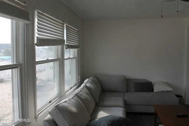 a view of entryway with a potted plant on a table