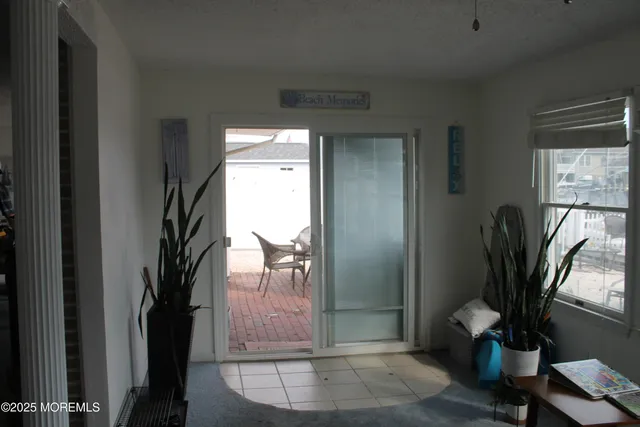 a room with furniture and a window