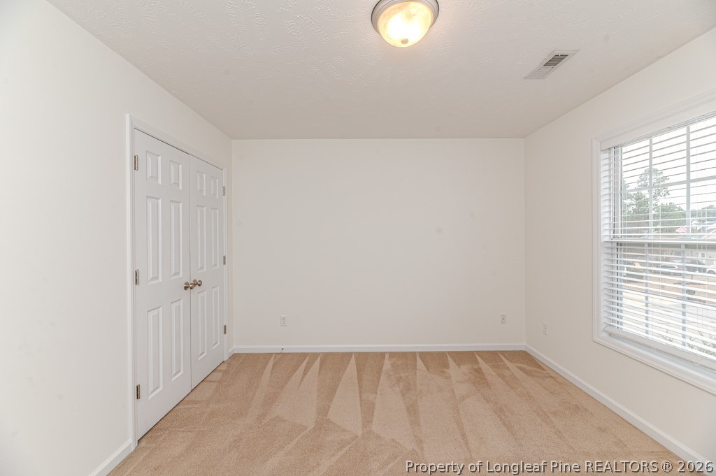 445 Hayden Lane Cameron, NC 28326 - Photo 27 of 49 an empty room with a window