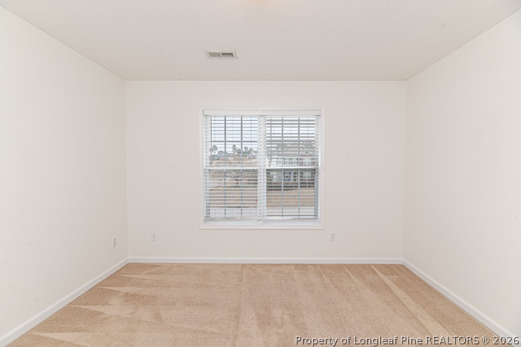 445 Hayden Lane Cameron, NC 28326 - Photo 28 of 49 an empty room with a window