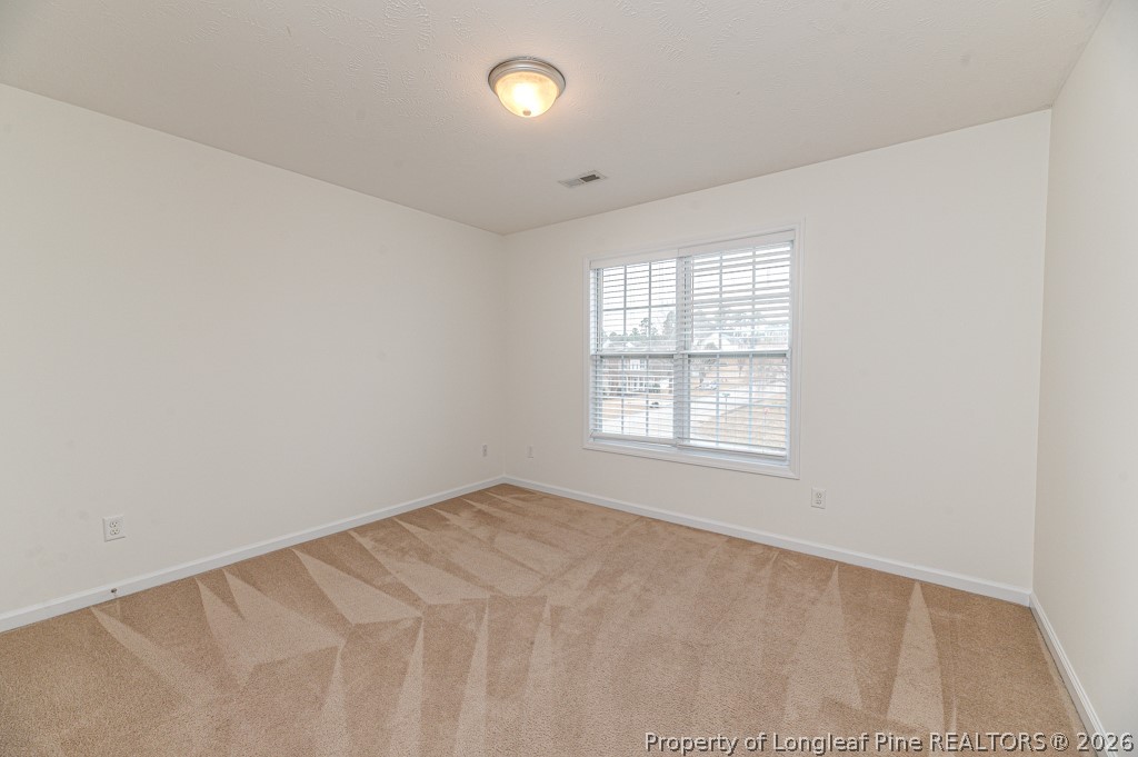 445 Hayden Lane Cameron, NC 28326 - Photo 29 of 49 an empty room with a window