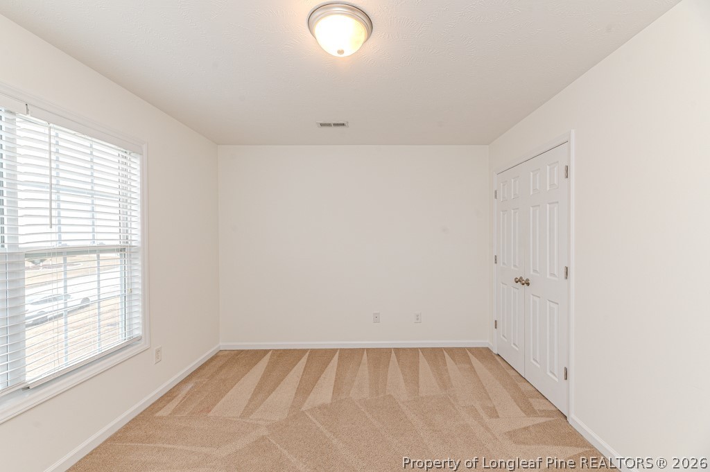 445 Hayden Lane Cameron, NC 28326 - Photo 33 of 49 an empty room with a window