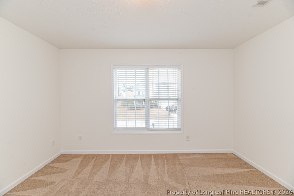 445 Hayden Lane Cameron, NC 28326 - Photo 34 of 49 an empty room with a window