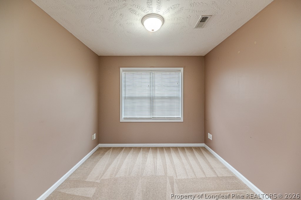 445 Hayden Lane Cameron, NC 28326 - Photo 35 of 49 a view of an empty room with a window