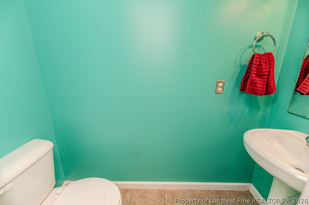 445 Hayden Lane Cameron, NC 28326 - Photo 42 of 49 a bathroom with a toilet and a sink