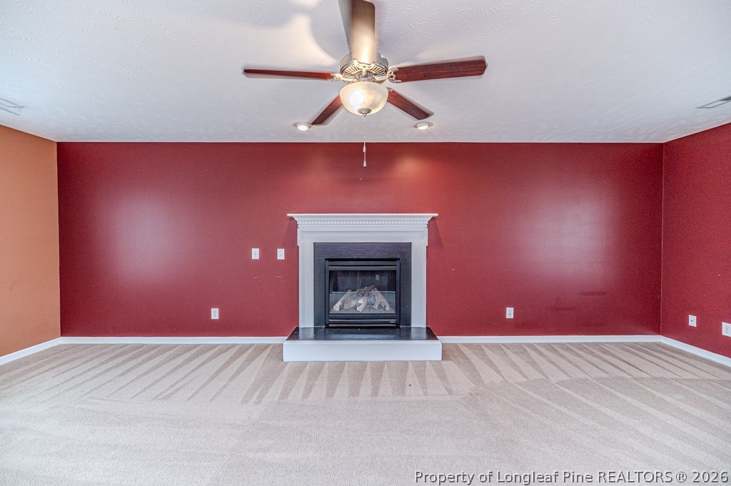 445 Hayden Lane Cameron, NC 28326 - Photo 5 of 49 a view of a livingroom with a fireplace and window