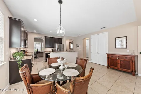 a view of a dining room with furniture