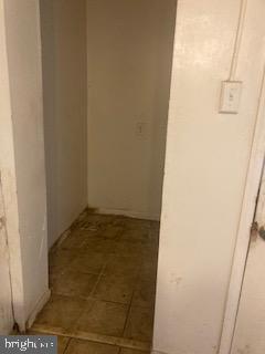 722 Shepherd Street Northwest Washington, DC 20011 - Photo 25 of 25 Empty hallway with potential for transformation.