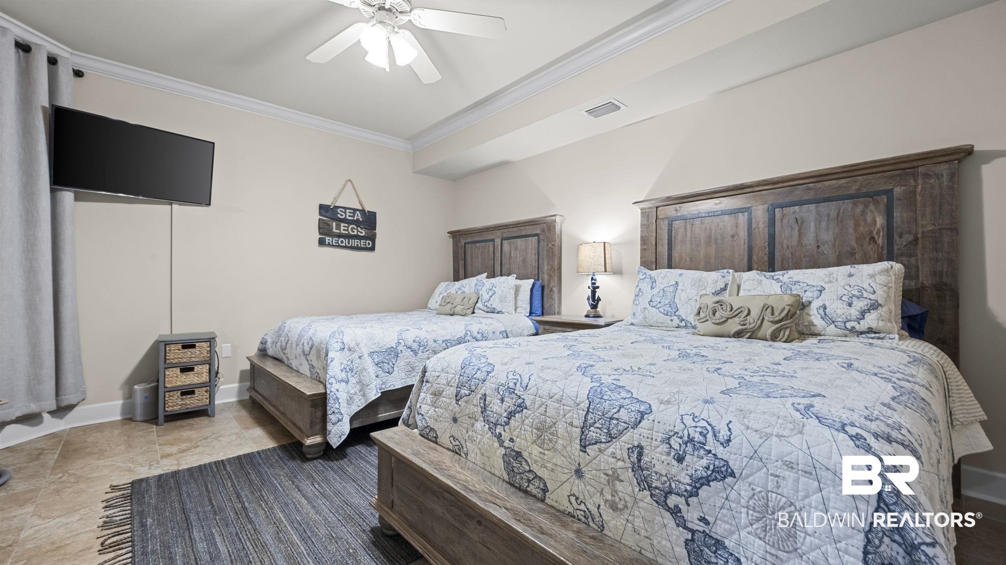27580 Canal Road, Unit 1526 Orange Beach, AL 36561 - Photo 21 of 49 Bedroom featuring ornamental molding and a ceiling fan