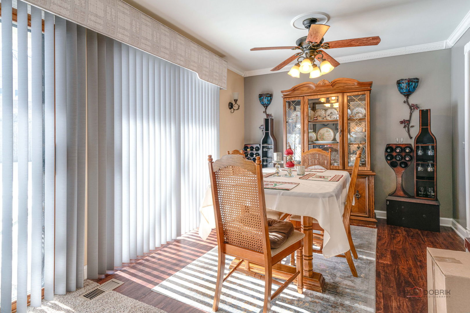 1157 Middlebury Lane, Unit B1 Wheeling, IL 60090 - Photo 7 of 18 a view of a dining room with furniture and window