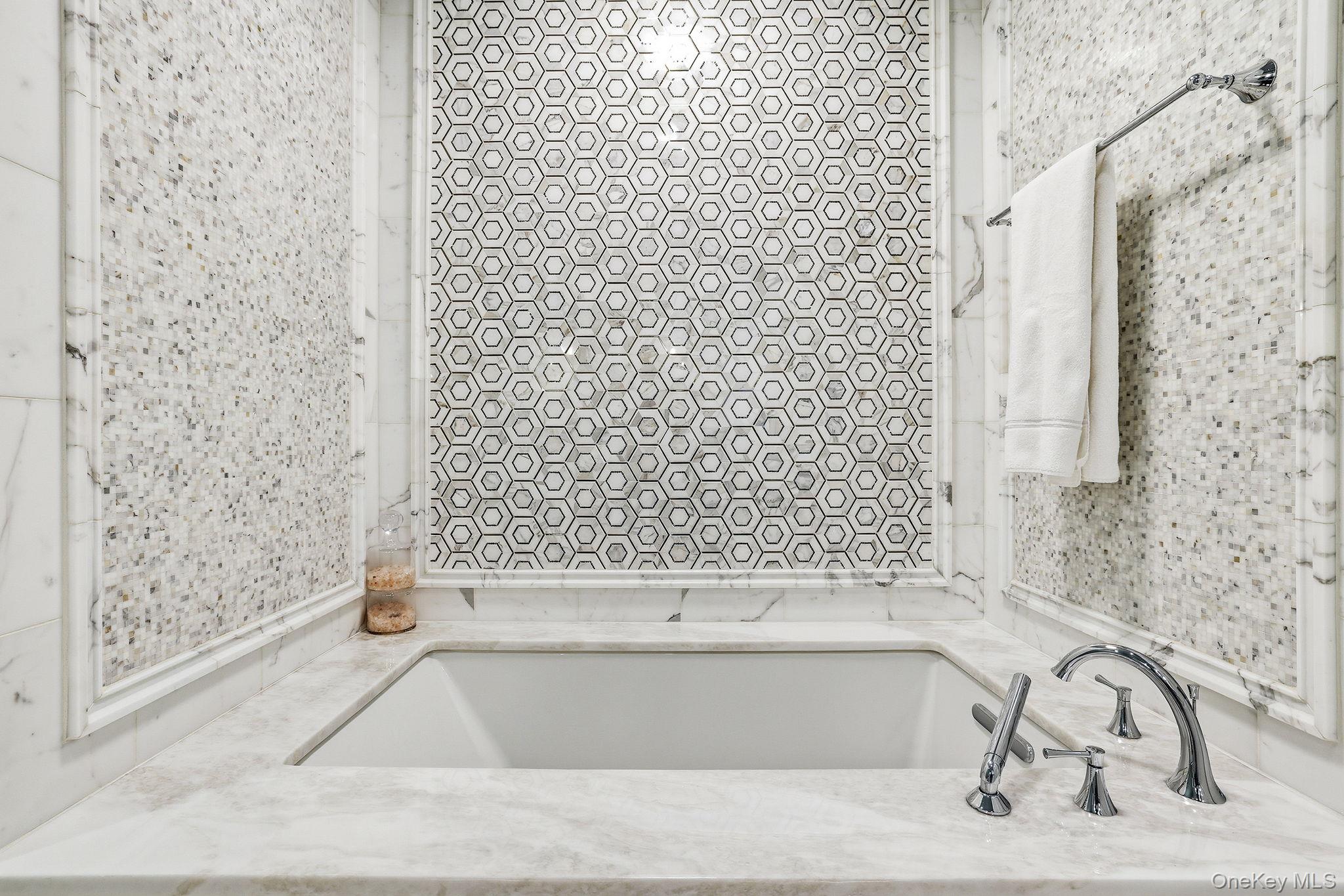 11 River Street, Unit 415 Sleepy Hollow, NY 10591 - Photo 22 of 37 a bathroom with a bathtub and shower