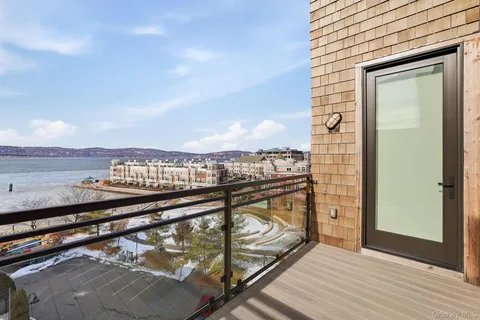 a view of a balcony with city view