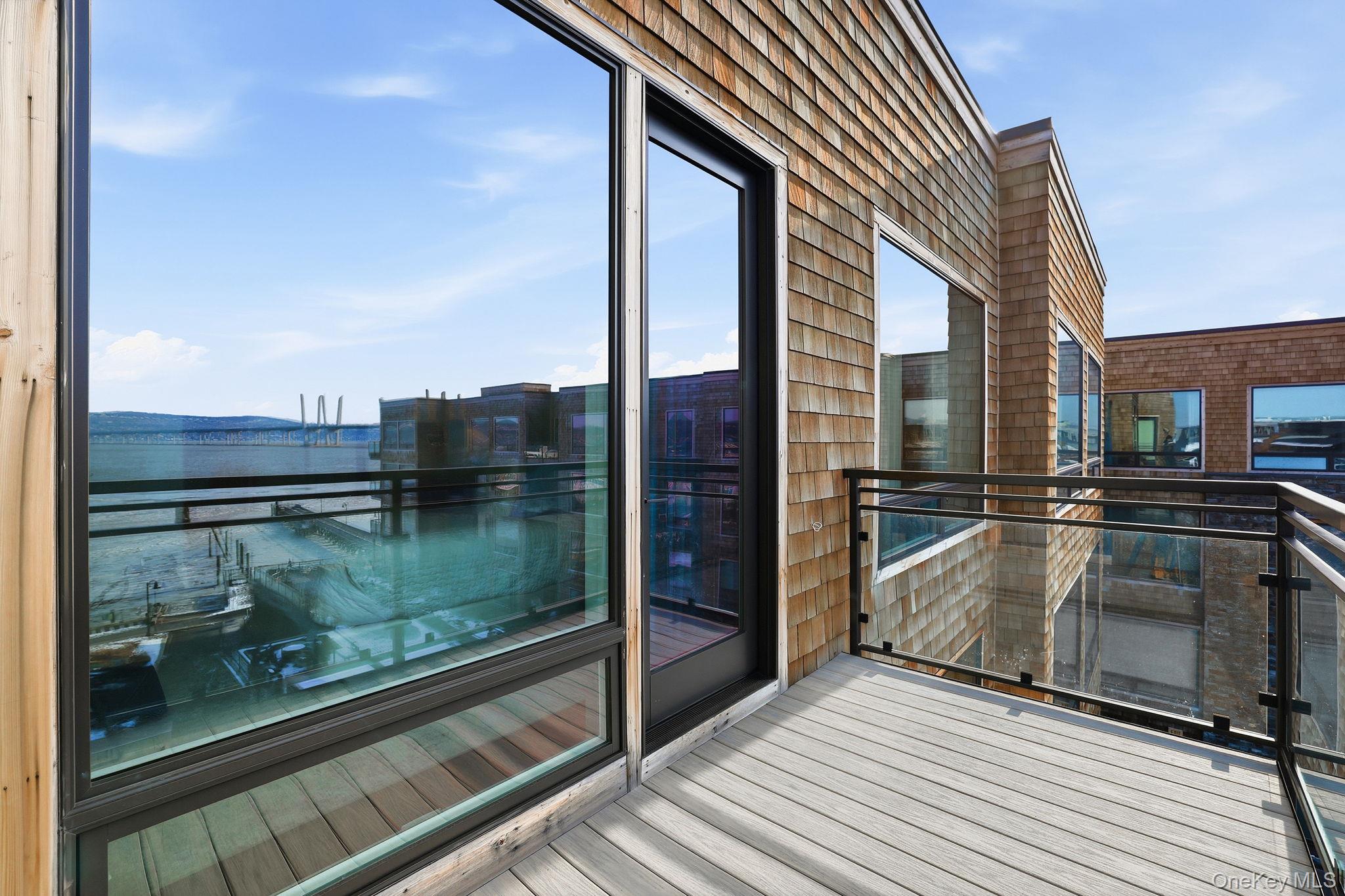 11 River Street, Unit 415 Sleepy Hollow, NY 10591 - Photo 31 of 37 a view of balcony with a floor to ceiling window