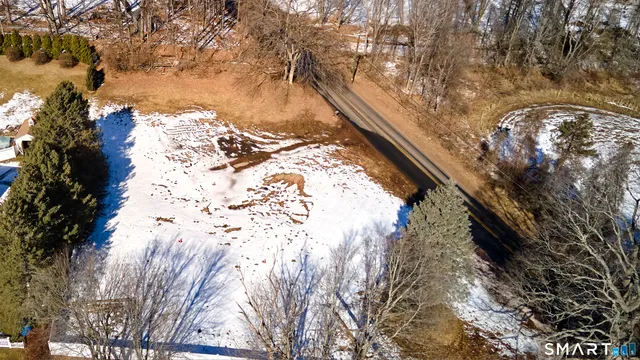 a view of snow on side of road