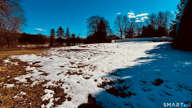 a view of road covered with snow